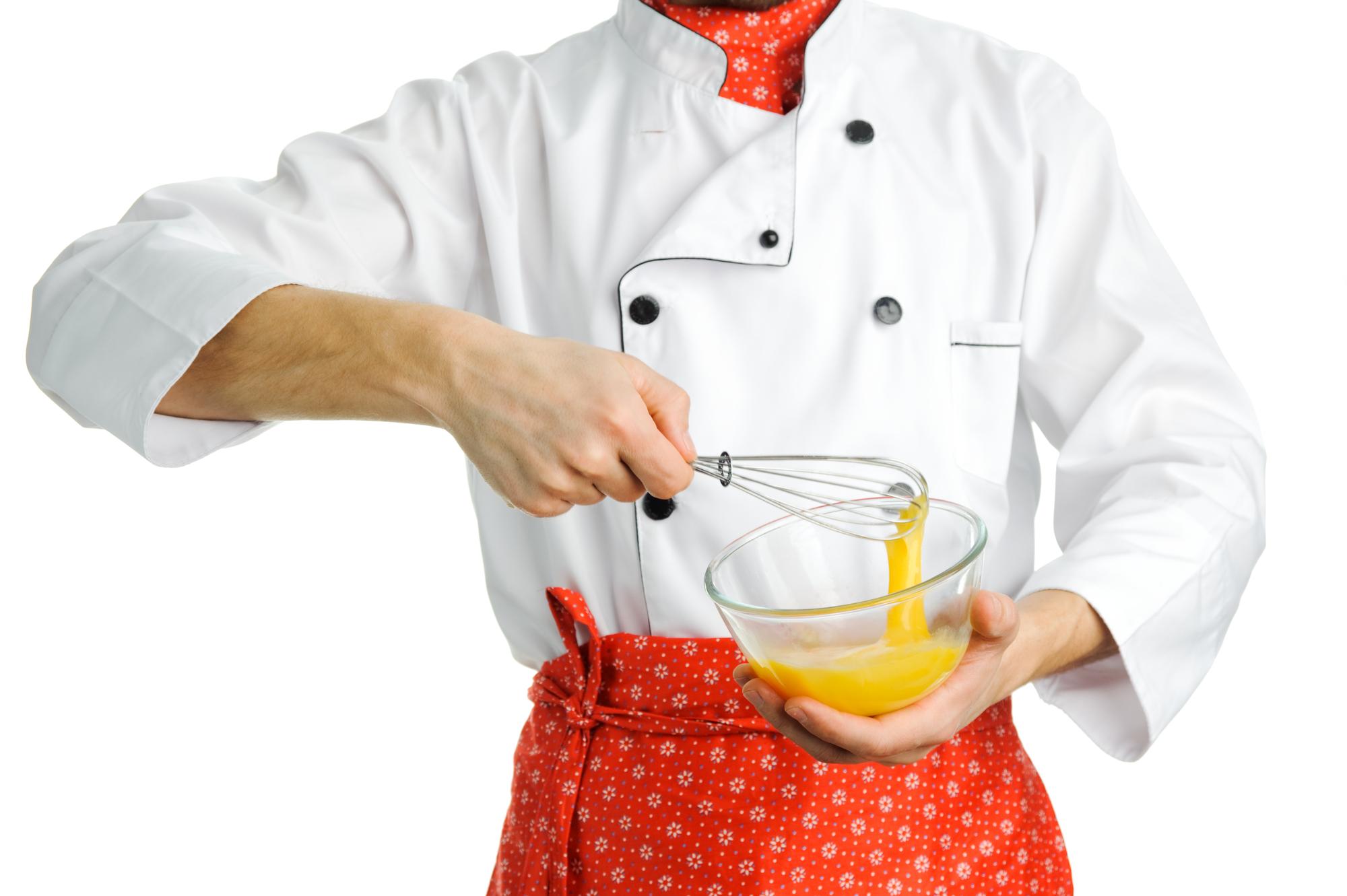Sous chef preparing sauce
